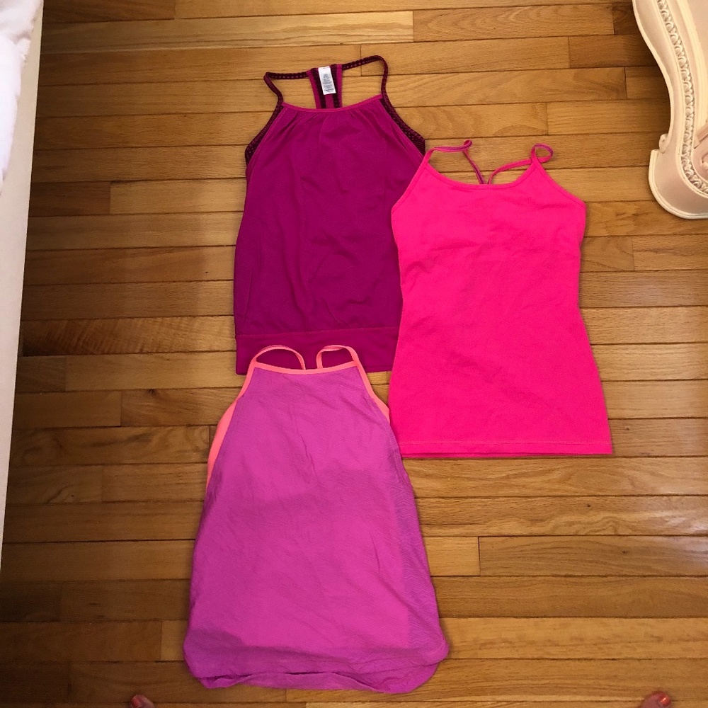 Trio of ivivva Pink Tank Tops